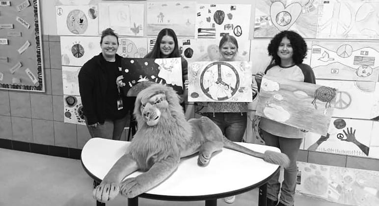 Pictured (left to right): Yorktown Secondary teacher Ellen Yosko, Gabby Gonzales, Allie Geffert, and Lily Peña. CONTRIBUTED PHOTO