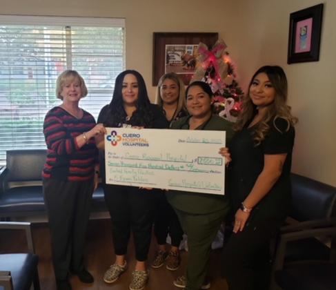 Candy Henderson, Vanessa Guerra-Goliad Clinic Director, Michelle Mellado, MA, Guadalupe Barrientos, LVN and Dana Portillo. A check for $3700.00 was presented to the Goliad clinic for new exam tables.