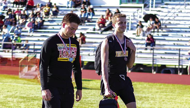 Wildcat sophomore Ryan Knostman (left) placed 2nd in the Discus and Shot put and Wildcat junior Sam Forbes (right) placed 3rd in the High Jump. Both advanced to area. CONTRIBUTED PHOTO