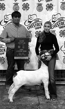 Briley Wieland shows her Grand Champion Goat at the 75th Annual Cuero Livestock Show. Since she had three champion animals up for auction, she decided to donate the sale of one of them back to the building fund. Her generosity inspired donations for this goat, totaling $78,000. (Donated photo.)