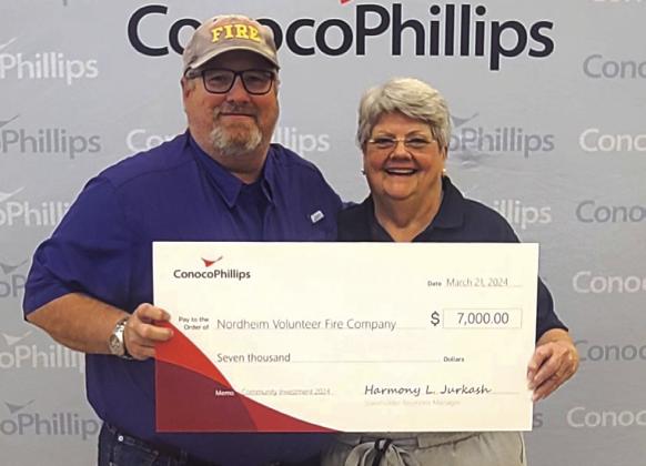 On left ConocoPhillips grant writer Stephen Gowens with Glynis Strause of ConocoPhillips. CONTRIBUTED PHOTO