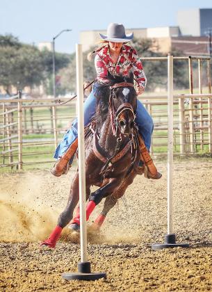 The first events of the 74th annual Cuero Livestock Show were held at the Harvey and Jane Mueller Rodeo Arena. Shown above is Madilyn Thomas running poles during the horse show Saturday afternoon. PHOTO BY SONYA TIMPONE/THE CUERO RECORD