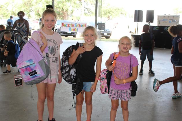 Backpack recipients pose for a picture at the 2019 Back to School Bash in honor of Ethosha Lynn Holman.