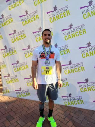 Randy Castillo, coach at Nordheim High School, competed in the Oct. 22 Run Against Cancer in downtown Victoria. 