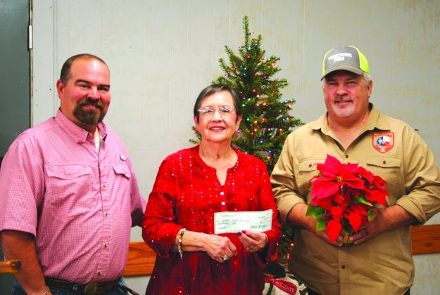 Kevin Lamprecht and Karl Mueller accept a donation from The Ladies Auxiliary for the local program from Rachel Robinson. CONTRIBUTED PHOTO