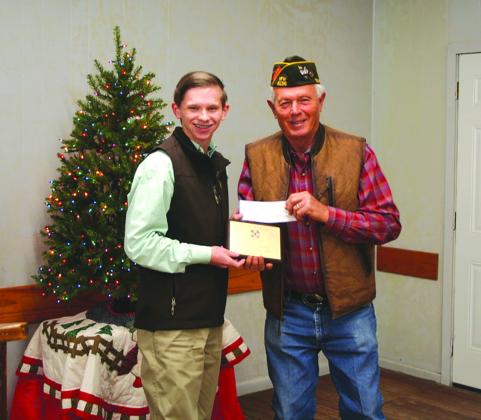 YHS Junior, Layne Geffert, read aloud his Winning Voice of Democracy Essay, to the delight of all. He received his award and prize money from Bill Menn. CONTRIBUTED PHOTO
