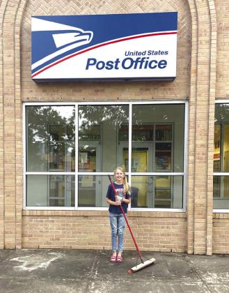 Camille Person swept up at the post office. CONTRIBUTED PHOTO