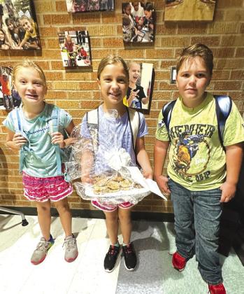 Branson Massey, Reese and Maesen Foerester took cookies to the school for teachers. CONTRIBUTED PHOTO