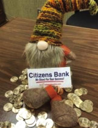He headed on over to Citizens Bank where he assisted in counting the coins. CONTRIBUTED PHOTO