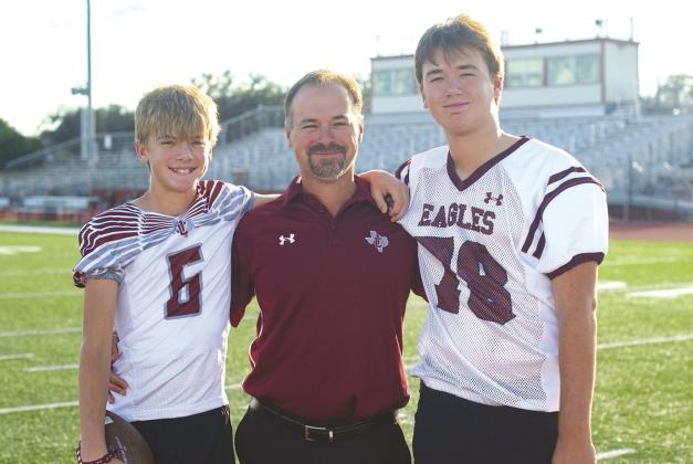 YISD’s new athletic director Ryan Knostman, center, is pictured with his two sons Ryan and Brayden. CONTRIBUTED PHOTO