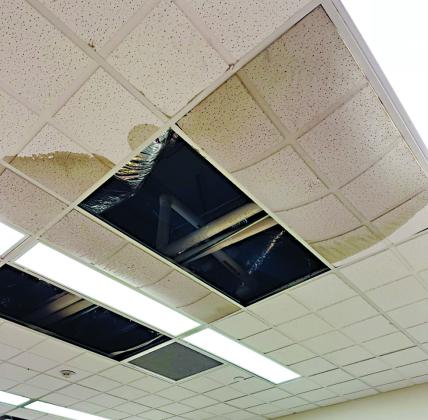 The suspended ceiling of the district clerk’s office in the DeWitt County Courthouse collapsed due to water accumulation week. PHOTO CONTRIBUTED BY HANS LAMMEMAN