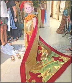 DeWitt County Historical Commission will walk down memory lane in their “Lives Remembered” presentation on Saturday, September 23 at the Friar Ag Center. Shown is a view of early Cuero and of a young lady modeling an historical costume.