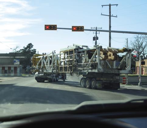 Opposing traffic allows for oversized load to complete a right turn safely. CONTRIBUTED PHOTO