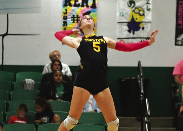 Kitty Kat senior Kendyll Sinast soaring in the air to spike a ball in a recent match. CONTRIBUTED PHOTO