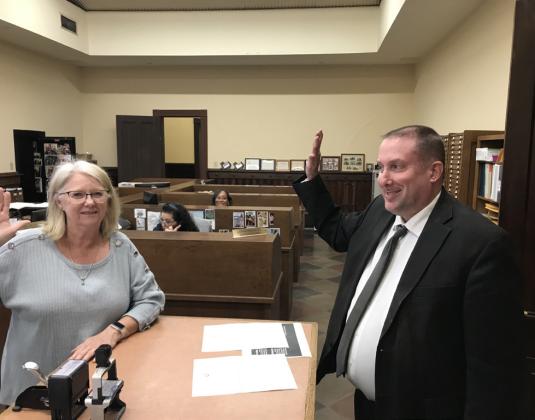 Ben Gray was sworn in by Goliad County District Clerk Vickie Quinn. CONTRIBUTED PHOTO