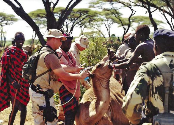 Steve dewormed camels during Exercise Noble-Piper Veterinary Civic Assistance Program in Kenya – April 2001