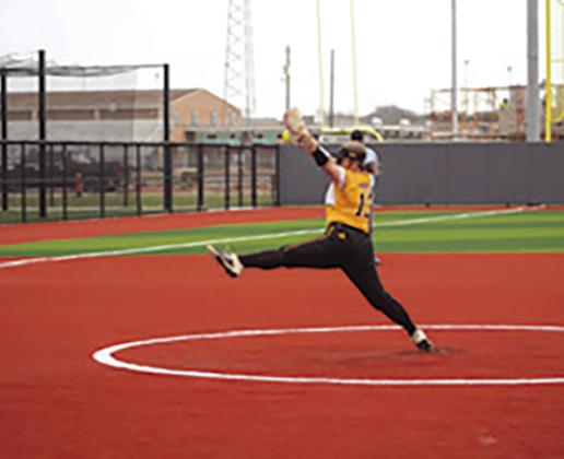 Kitty Kat Junior, Faith Everitt, winds and throws to the plate. CONTRIBUTED PHOTO