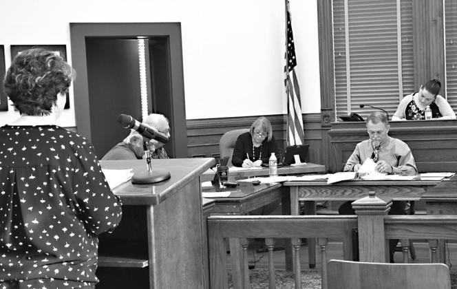 Lightsource BP representative Kimberly Wells answers questions from DeWitt County Commissioners concerning a RUA between the County and Shaula Energy Project LLC during the Feb. 13 meeting. PHOTOS CONTRIBUTED BY HANS LAMMEMAN