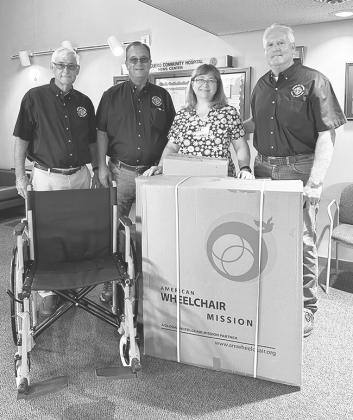The Cuero Knights of Columbus Council 1682 recently donated three wheelchairs to Cuero Home Health. Pictured from left are Bill Morrow, Knights of Columbus district deputy; Bryan Haun, Knights of Columbus member; Margaret Krause, Cuero Home Health administrator; and Anthony Netardus, Knights of Columbus Grand Knight. CONTRIBUTED PHOTO