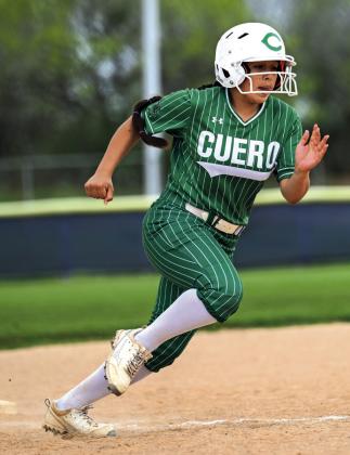 Laelah Mendiola rounds third and heads home to score another Cuero run.