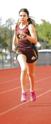 Distance runner Percy Torrez sets her pace.