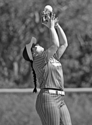 Shortstop Lainee Ballin catches a pop fly.