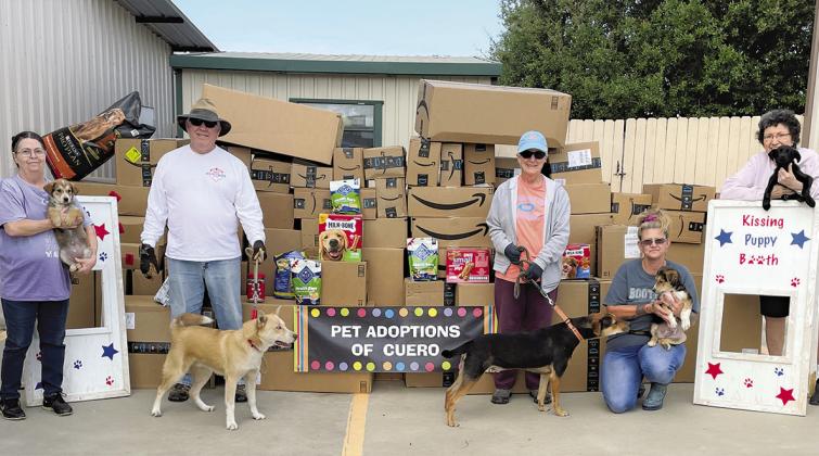 Houston K911 Rescue sent pet food and supplies to Pet Adoptions of Cuero. A total of 130 boxes/packages have been sent to PAOC via Amazon. Pictured is Sandra Taylor, Paul Huber, Nelda Huber, Jamie Osborne and Linda Anzaldua CONTRIBUTED PHOTO